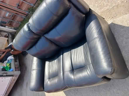 Photo of free 2 seater sofa black (Wembley) #1
