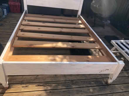 Photo of free Pine bed frame. Double. Detaches into 4 parts plus the slats (Ham TW10) #1