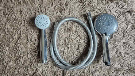 Photo of free Two showerheads and a hose (Norcot RG30) #1