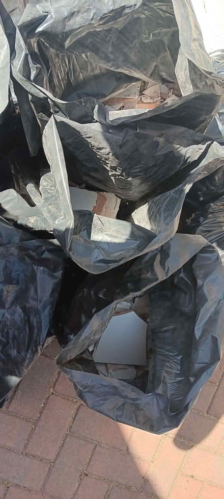 Photo of free 8 bags of broken tiles for hardcore etc (Hartwood Green PR7) #1