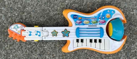 Photo of free Battery-operated toy guitar (Valencia Avenue, Sunnyvale) #1