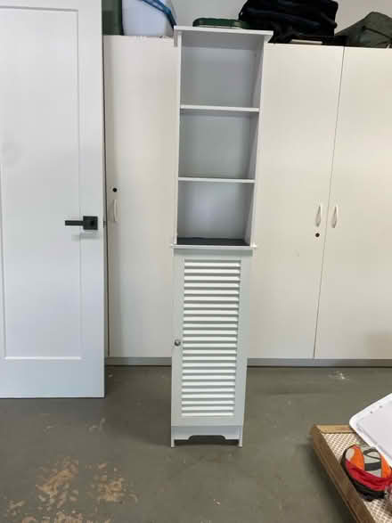 Photo of free Tall Skinny Bathroom Cabinet (Wooton High School) #1