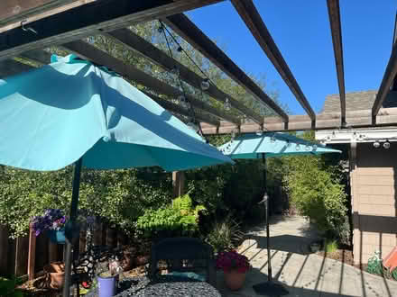 Photo of free 2 patio umbrellas (Harbor Bay) #1