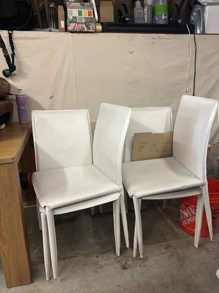 Photo of free Four white leather chairs (Sea Cliff) #1