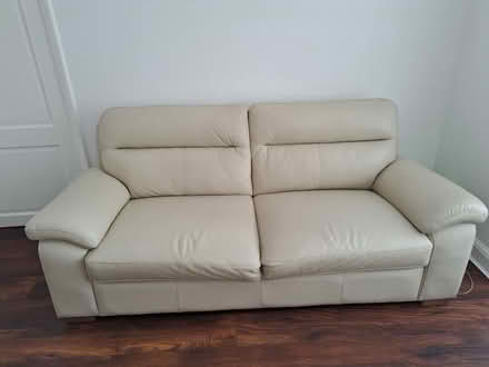 Photo of free Two cream leather sofas (Leatherhead) #2