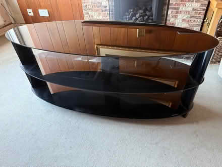 Photo of free Oval glass TV stand (Knutsford) #1