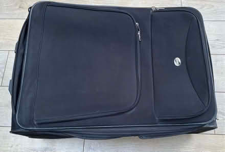 Photo of free Large suitcase black (Whitchurch CF14) #1