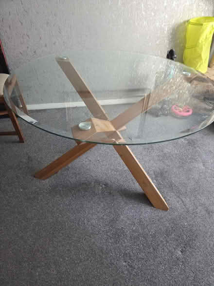 Photo of free Glass round table + 4 chairs (Merley BH21) #1