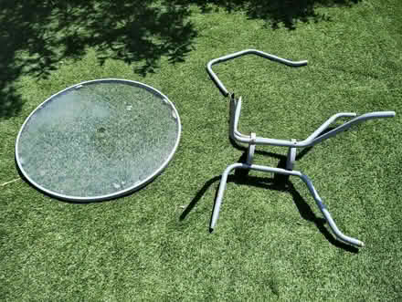 Photo of free Outdoor table, circular glass top (Bagslate Moor OL11) #4