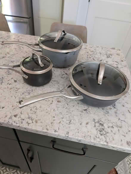Photo of free Calphalon pots with lids (20910) #1