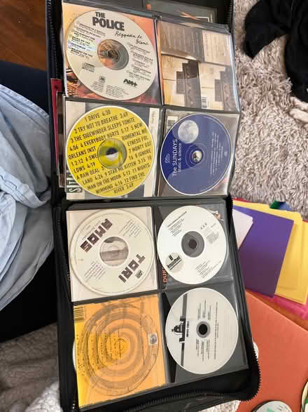 Photo of free Old CD’s in a zip up pouch (Roxbury) #3
