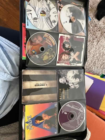 Photo of free Old CD’s in a zip up pouch (Roxbury) #2