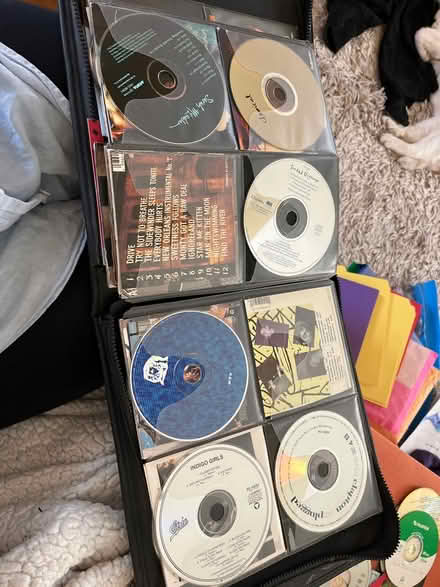 Photo of free Old CD’s in a zip up pouch (Roxbury) #1