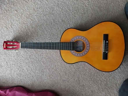 Photo of free 3/4 guitar (black case) (Tilehurst, Reading) #1