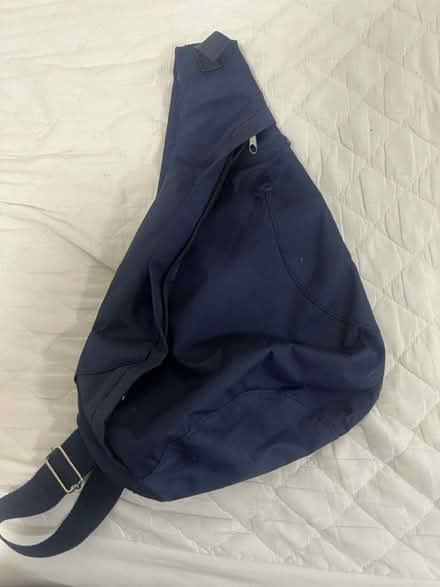 Photo of free Blue sling bag - needs repair (Euston WC1H) #1