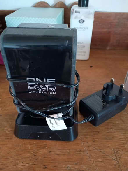 Photo of free One PWR battery + charger - kaput (Greystoke CA11) #1