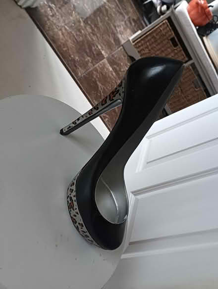 Photo of free Heavy weighted wine bottle holder (Greystones) #1