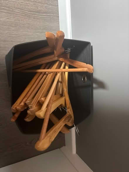 Photo of free 12 wooden coat hangers (Prestbury, SK10) #1