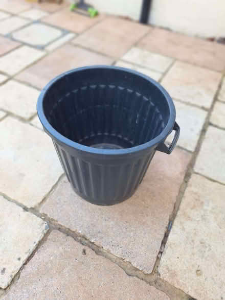 Photo of free Black bin 50cm tall, 52cm diam. Summer ice bucket? (GU10) #1