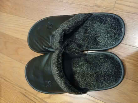 Photo of free Pair of fuzzy black slippers size 9 (Mountain View near downtown) #1