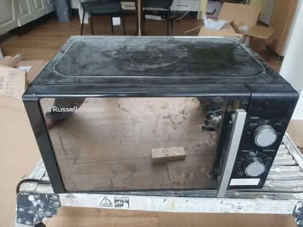 Photo of free Black Russell Hobbs microwave (Raynes Park SW20) #1