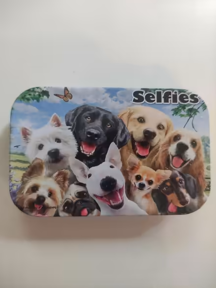 Photo of free Cute dog tin (Weybridge, KT13) #1