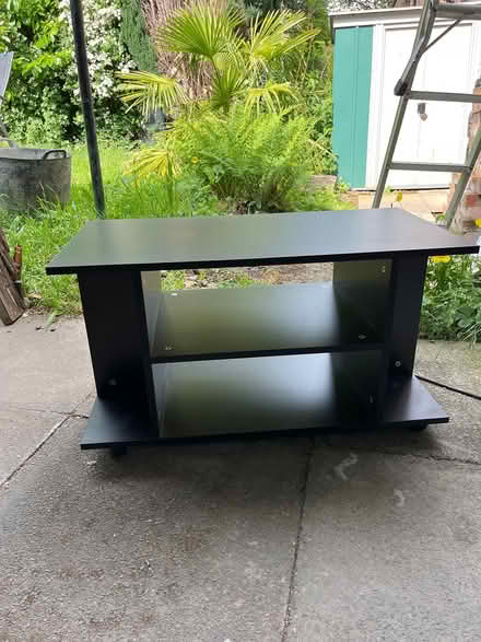 Photo of free Black TV stand (Low Edges S8) #2