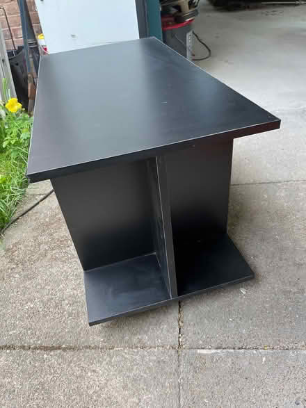 Photo of free Black TV stand (Low Edges S8) #3
