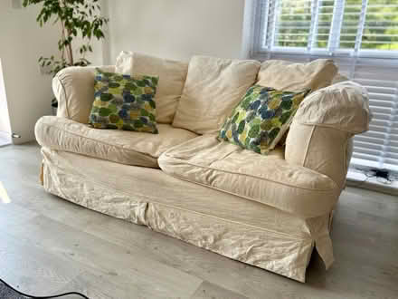 Photo of free Large two seater cream sofa (BN1) #2