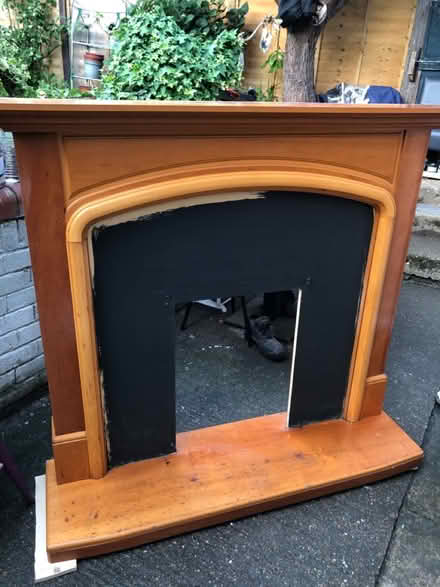 Photo of free Brown wooden fireplace screen (Chessington) #1