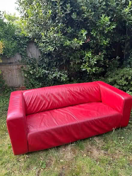 Photo of free Red leather sofa (Raynes Park SW20) #1