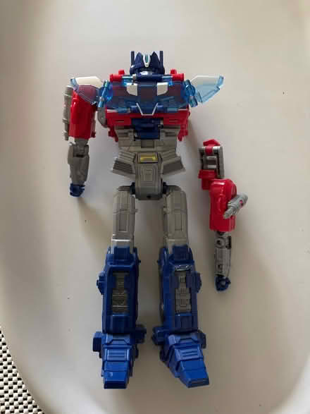 Photo of free Optimus Prime Power Flip-arm broken (Old Mill Grove Rd playground) #1