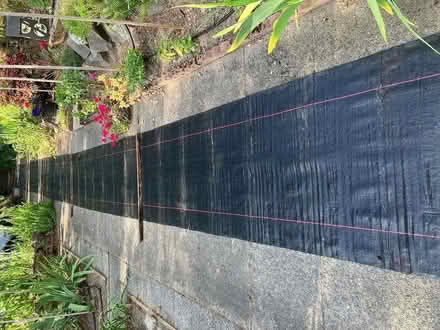 Photo of free 90' Black woven plastic sheeting (Fremont) #1