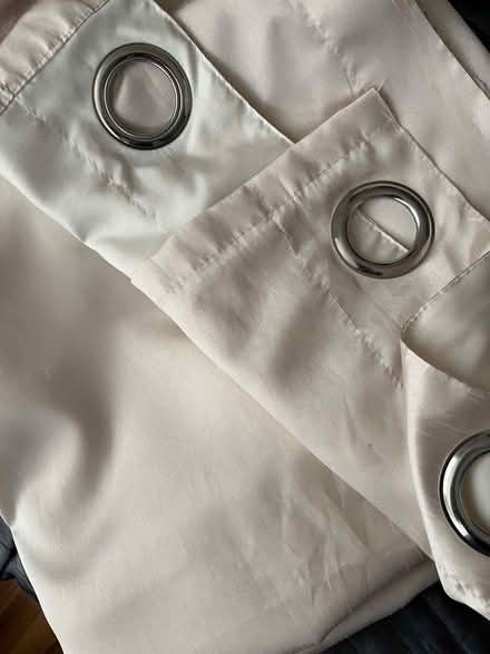 Photo of free pair of eyelet cream faux silk lined curtains (Stepney E1) #1
