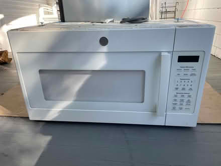 Photo of free GE Microwave/Range Hood Combo (Cleveland Park) #1