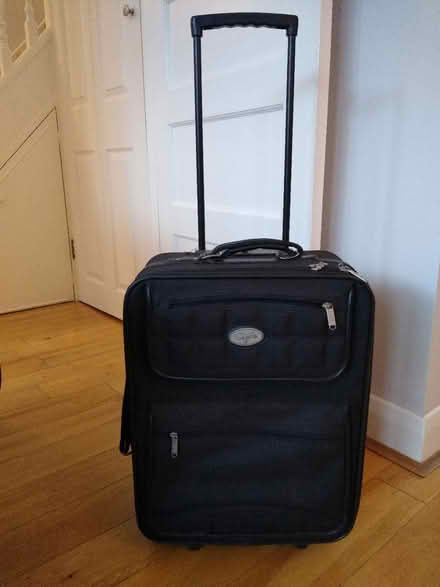 Photo of free Small black suitcase on wheels (Twickenham) #2
