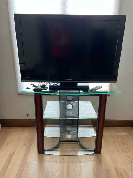 Photo of free Flat screen TV and stand (North of Cass and 75th) #1