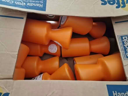 Photo of free 11 orange plastic charity collection boxes (Skipton BD23) #1