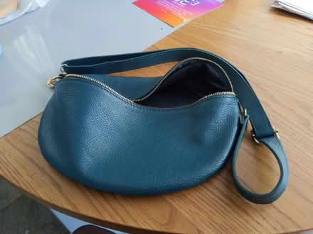Photo of free Green sling bag (Lewisham SE4) #1