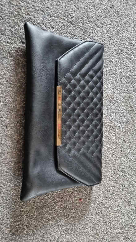 Photo of free Black leather clutch bag (Crystal Peaks S20) #1