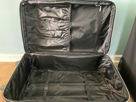 Photo of free 4 black suitcases (Dewsbury WF13) #1