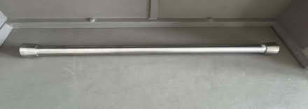 Photo of free Sprung curtain/shower curtain rail (Raynes Park SW20) #2