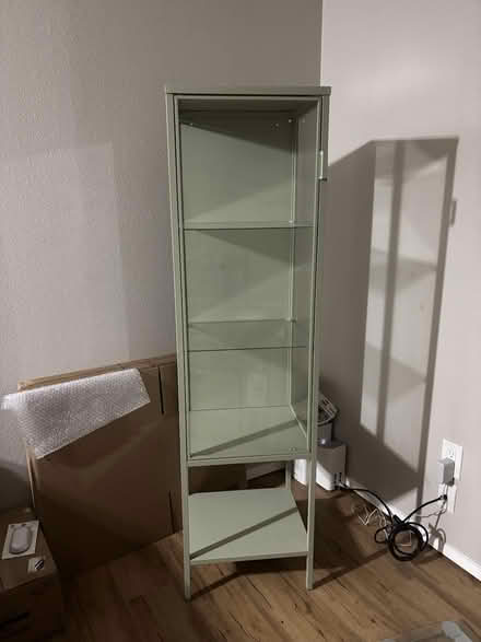 Photo of free Glass-door cabinet, light green (U-District) #1