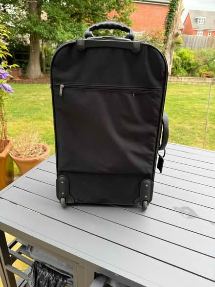 Photo of free Black extendable suitcase. Dunlop (RG7 1gx) #2