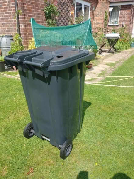 Photo of free Black Wheelie bin with two holes (Winkfield Row RG42) #3