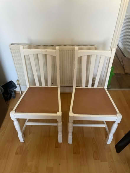 Photo of free Set of 2 white wooden dining chairs (Walthamstow) #1