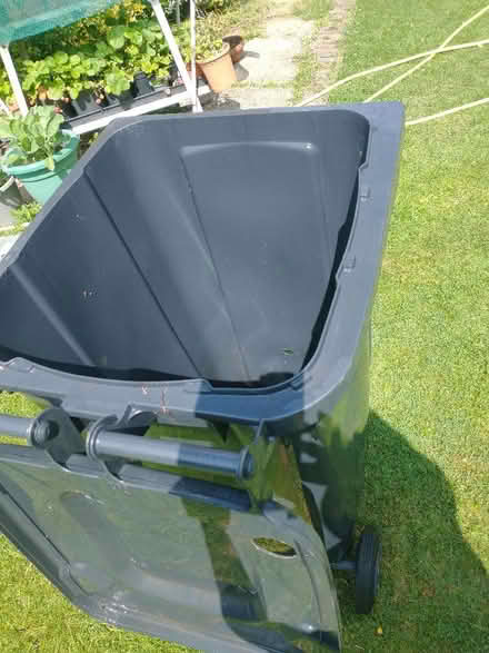 Photo of free Black Wheelie bin with two holes (Winkfield Row RG42) #4