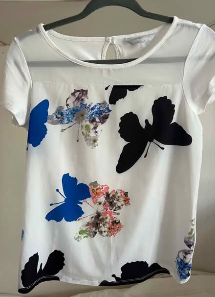 Photo of free Women top size 8 (TW2) #1