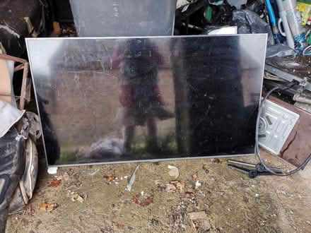 Photo of free Big tv with stand not sure if works (Pathead EH37) #1