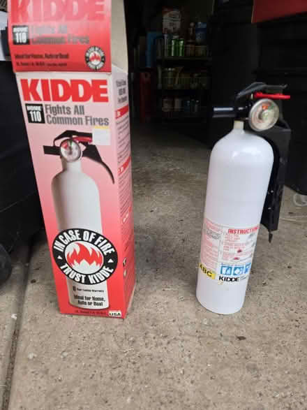 Photo of free Small fire extinguisher, never used (Near 63rd and Woodward) #1